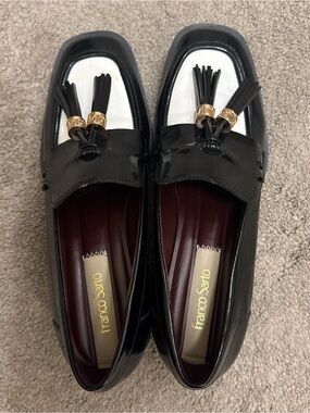 Franco Sarto Navy Blue and White Patent Tassel Loafers with Gold Accents.